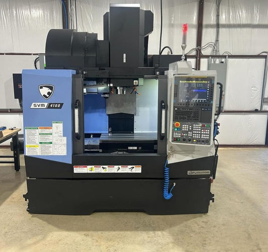 DN Solutions SVM 4100 vertical machining center in the Custom Machined Concepts workshop, showcasing advanced CNC technology for precision manufacturing of firearm parts.